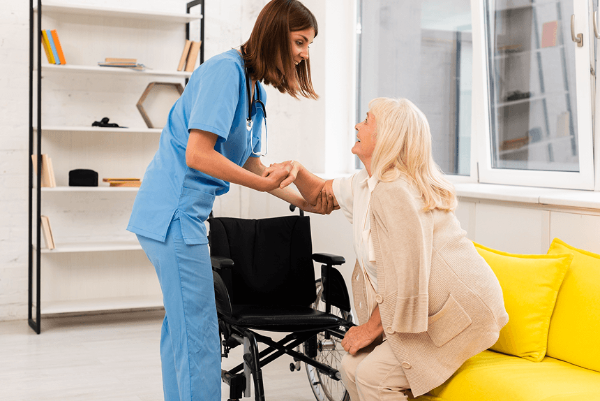 Caregiver assisting client with mobility in a warm home setting