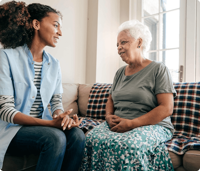 Caregiver and client in a supportive home setting